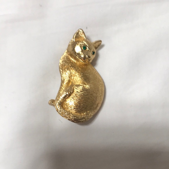 Christian Dior authentic cat gold plated cat brooch.